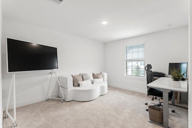 office space with baseboards and carpet