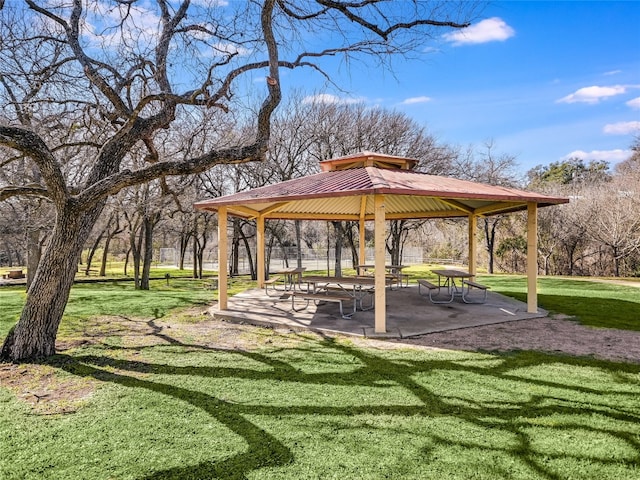 view of home's community featuring a patio, a gazebo, and a yard