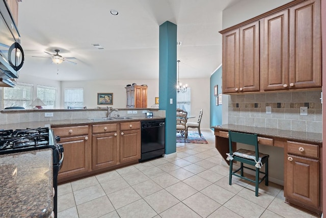 1720 Woodvista Pl, Round Rock, TX 78665 - kitchen featuring black dishwasher, a sink, ceiling fan, decorative backsplash, and a chandelier