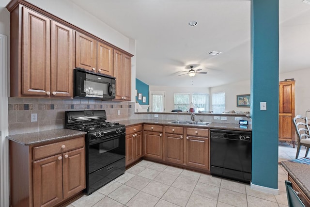 1720 Woodvista Pl, Round Rock, TX 78665 - kitchen featuring black appliances, a sink, a ceiling fan, tasteful backsplash, and light tile patterned floors