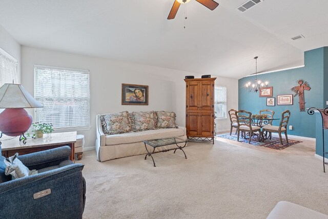 1720 Woodvista Pl, Round Rock, TX 78665 - living area with a chandelier, light carpet, baseboards, ceiling fan, and lofted ceiling