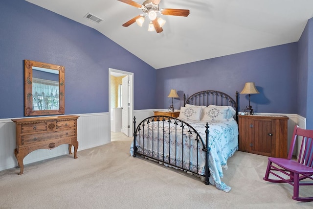 1720 Woodvista Pl, Round Rock, TX 78665 - carpeted bedroom with lofted ceiling, wainscoting, and a ceiling fan
