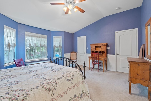 1720 Woodvista Pl, Round Rock, TX 78665 - bedroom with lofted ceiling, a wainscoted wall, carpet floors, and ceiling fan