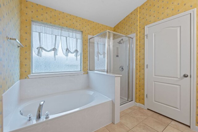1720 Woodvista Pl, Round Rock, TX 78665 - bathroom with wallpapered walls, a stall shower, a garden tub, and tile patterned floors