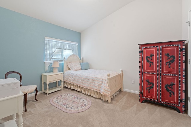 carpeted bedroom with baseboards