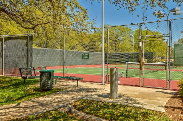 7419 Dallas Dr, Austin, TX 78729 - view of tennis court with a gate