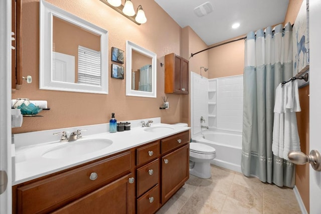 bathroom with a sink, toilet, double vanity, and shower / bath combination with curtain