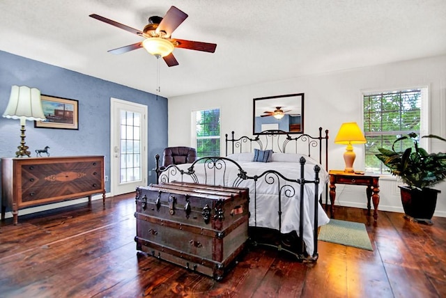 bedroom with hardwood / wood-style floors