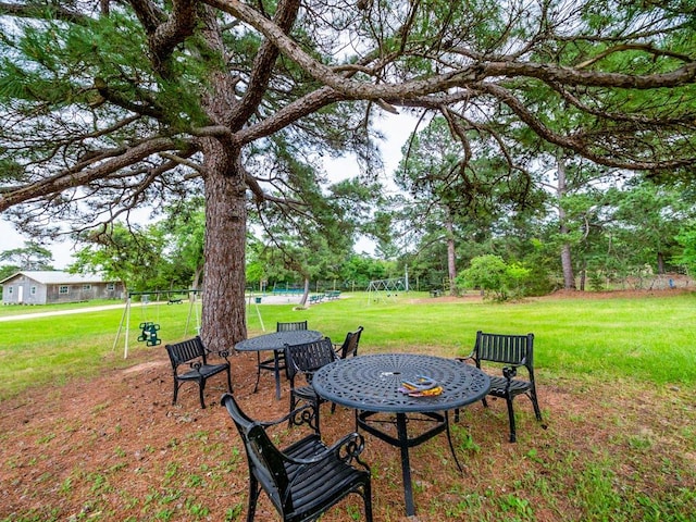 view of yard featuring playground community