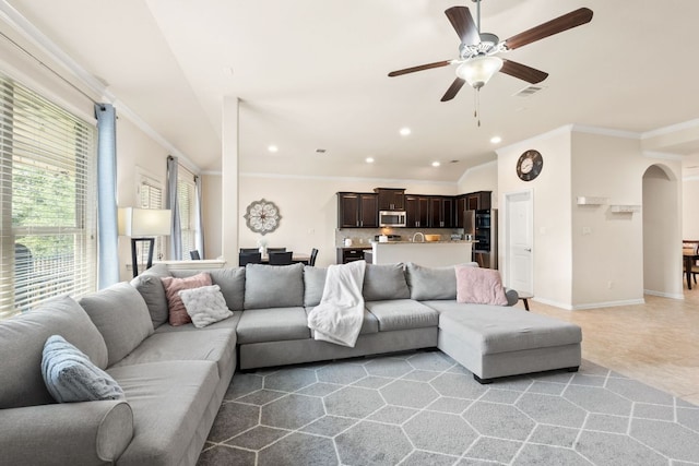 4018 Geary St, Round Rock, TX 78681 - living area featuring recessed lighting, crown molding, ceiling fan, baseboards, and arched walkways