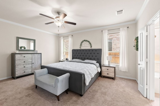 bedroom featuring visible vents, crown molding, multiple windows, and light colored carpet