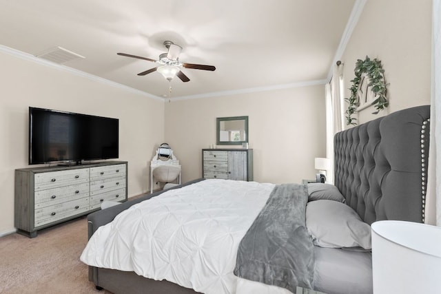 carpeted bedroom with crown molding, ceiling fan, and visible vents