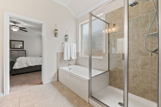 bathroom with vaulted ceiling, ornamental molding, a garden tub, and a stall shower