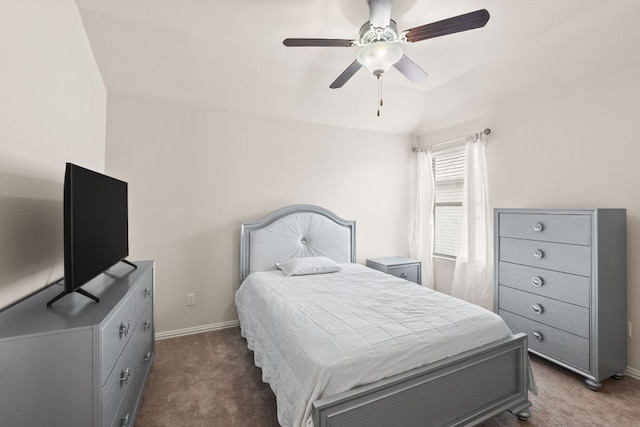 bedroom featuring baseboards, a ceiling fan, and carpet flooring