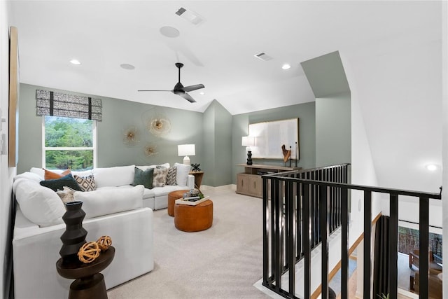 interior space featuring recessed lighting, ceiling fan, visible vents, and vaulted ceiling