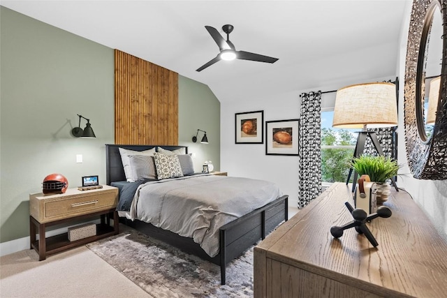 bedroom featuring carpet flooring, ceiling fan, and vaulted ceiling