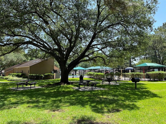 8610 Pine Falls Dr, Houston, TX 77095 - view of property's community featuring a lawn