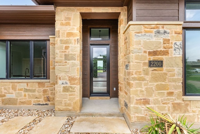 2317 Kahala Sunset Dr, Spicewood, TX 78669 - view of exterior entry with stone siding