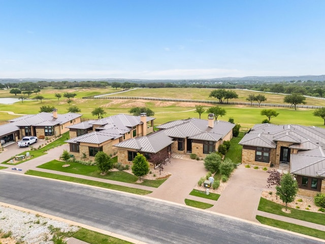 2317 Kahala Sunset Dr, Spicewood, TX 78669 - birds eye view of property featuring a water view and view of golf course