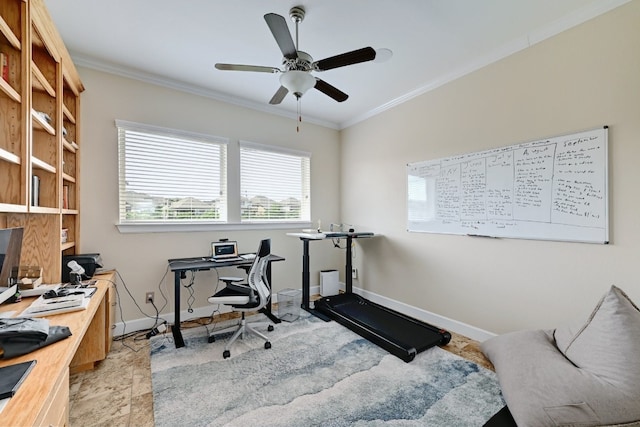 office space with crown molding, baseboards, and ceiling fan