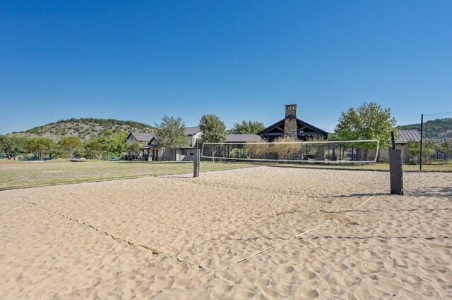 18720 Waltz Ct, Austin, TX 78738 - view of home's community with volleyball court