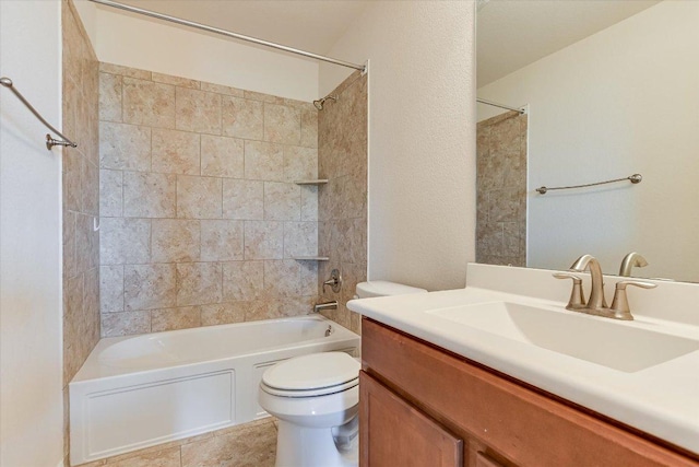 full bath with shower / tub combination, tile patterned floors, toilet, and vanity