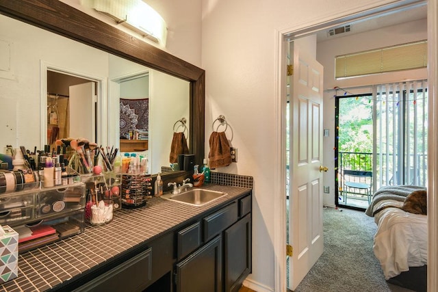bathroom featuring visible vents and vanity