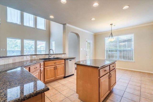 3012 Centennial Olympic Park, Austin, TX 78732 - kitchen featuring dishwasher, a sink, arched walkways, light tile patterned floors, and recessed lighting