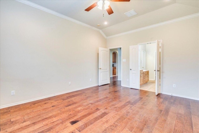 3012 Centennial Olympic Park, Austin, TX 78732 - unfurnished bedroom featuring light wood finished floors, baseboards, lofted ceiling, ornamental molding, and ensuite bath
