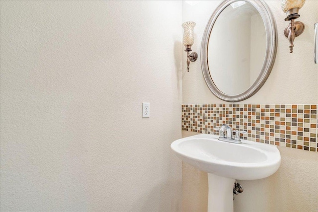 3012 Centennial Olympic Park, Austin, TX 78732 - bathroom featuring tasteful backsplash