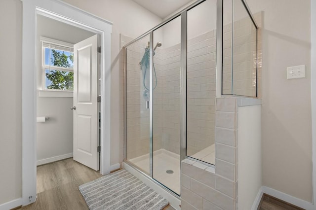 505 Pearly Eye Dr Unit B, Pflugerville, TX 78660 - full bath with baseboards, a stall shower, and wood finished floors