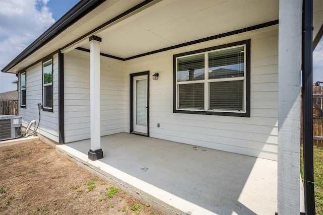 exterior space with central AC and a patio area