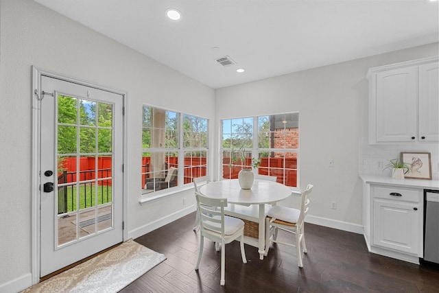 10700 Galsworthy Ln, Austin, TX 78739 - dining space with plenty of natural light, baseboards, dark wood-type flooring, and visible vents