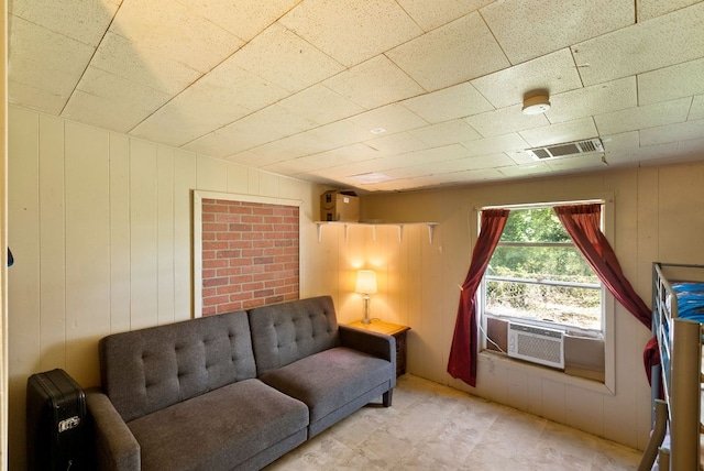 520 Munson St, Tow, TX 78672 - living room with cooling unit, wood walls, and visible vents