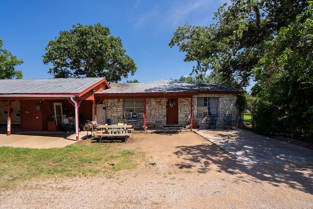 520 Munson St, Tow, TX 78672 - rear view of property with stone siding