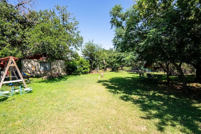 520 Munson St, Tow, TX 78672 - view of yard with a playground