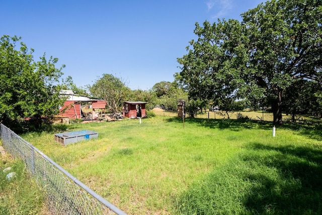 520 Munson St, Tow, TX 78672 - view of yard with fence, an outbuilding, and a shed