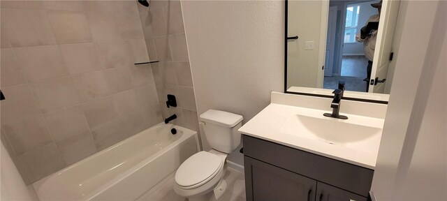 118 Freeman Day Dr, Bastrop, TX 78602 - bathroom with toilet, vanity, and tub / shower combination