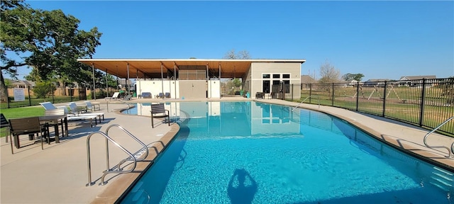 118 Freeman Day Dr, Bastrop, TX 78602 - community pool featuring a patio