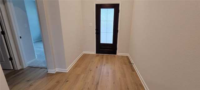 118 Freeman Day Dr, Bastrop, TX 78602 - foyer entrance with light wood-type flooring and baseboards