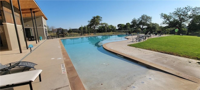 118 Freeman Day Dr, Bastrop, TX 78602 - community pool featuring a patio