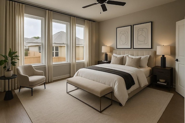 118 Freeman Day Dr, Bastrop, TX 78602 - bedroom featuring light wood-type flooring and ceiling fan