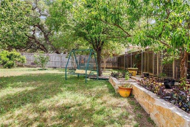20603 Camel Back St, Lago Vista, TX 78645 - view of yard with a playground
