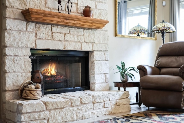 interior space with tile patterned floors and a fireplace