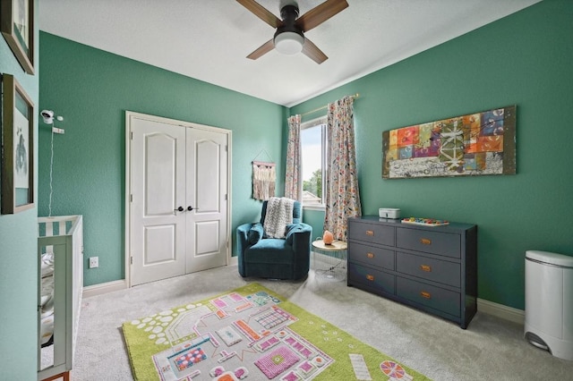 game room with carpet flooring, ceiling fan, and baseboards