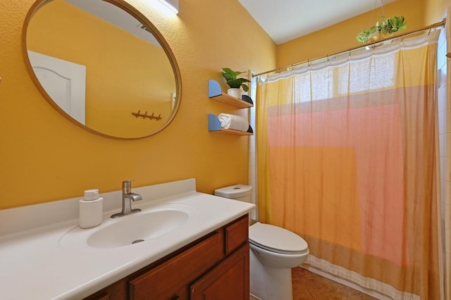 full bath featuring vanity, tile patterned floors, toilet, and curtained shower