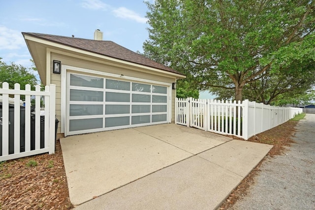 garage featuring fence