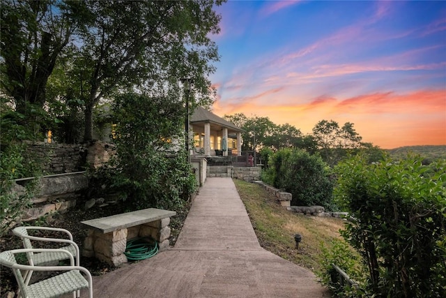18408 W Rim Dr, Jonestown, TX 78645 - view of back of house at dusk