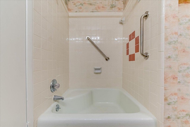 8518 Fathom Cir Unit 107, Austin, TX 78750 - bathroom featuring wallpapered walls and shower / bath combination