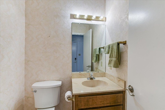 8518 Fathom Cir Unit 107, Austin, TX 78750 - half bathroom featuring vanity and toilet